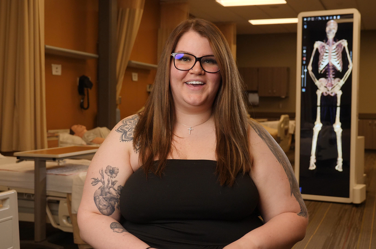 Female student facing camera